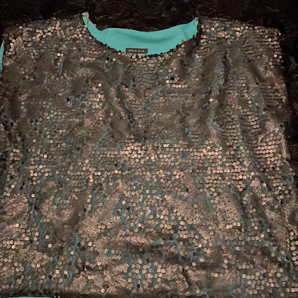 Black gold top with black sequence with a turquoise undershirt